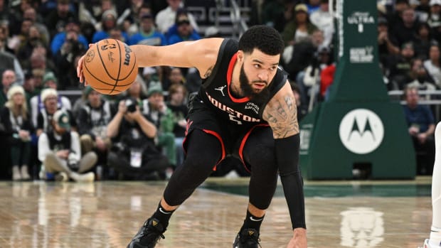 Rockets guard Fred VanVleet (5) brings the ball up the court against Milwaukee Bucks at Fiserv Forum.